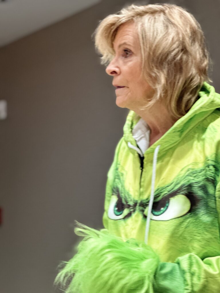 Tampa Day School's Head of School dresses as the Grinch to kick off a Professional Development Training on Executive Functions for our staff.