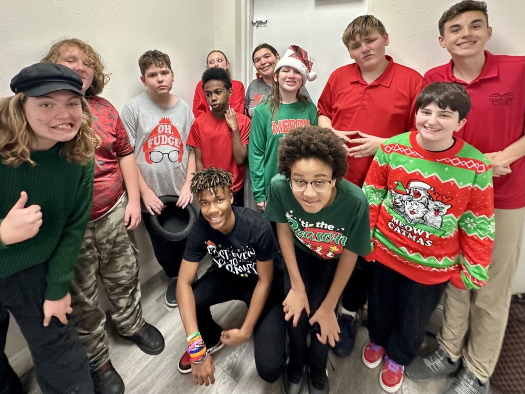 Tampa Day School students gather for a group photo before their improv show